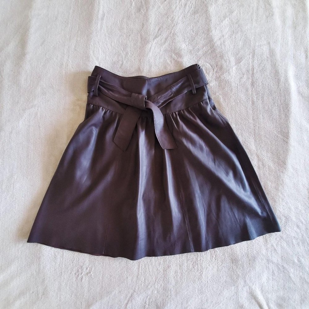 vintage rustic brown Donna di Eleganza leather A-line bowtie belt raw hem skirt